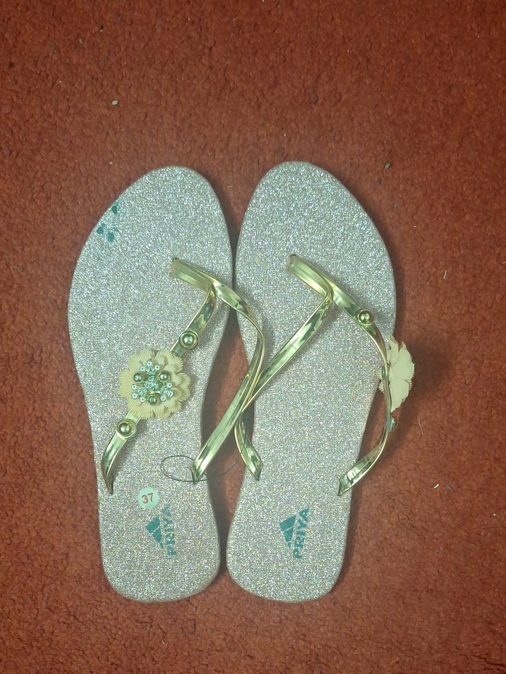 Glittery Floral Jelly Flip Flops in Gold and Pink